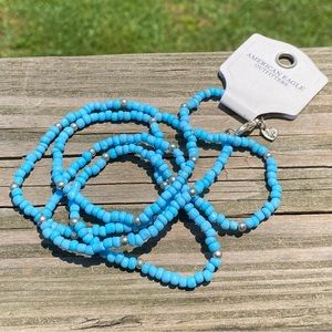 American Eagle Outfitters baby blue bead necklace silver tone accents 36” NWT